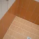 Mid century modern green orange white bathroom shower tile