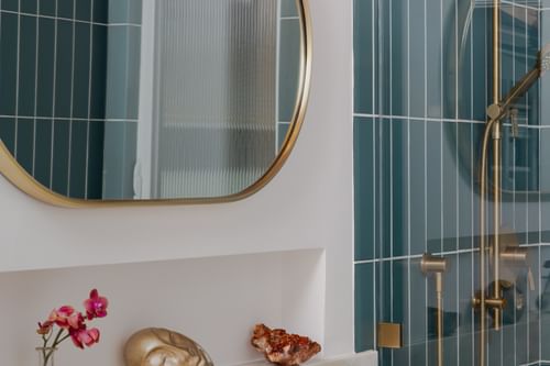 Rae Rockwell: Modern Blue Glass Bathroom