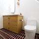 Modern red brick bathroom floor