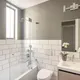 2018 img residential bathroom rights noz design frank oreilly install wainscott color block two tone white wash 6x12 offset 2x6 skipping stone 1 4 offset shower surround walls floor 4 magnetite FC210961